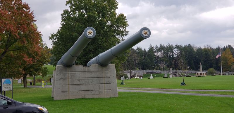Those Two Massive Guns at the Gate