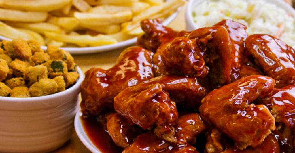 This Illinois Fried Chicken Restaurant Covers Its Crispy Wings and Fries With a Signature Chicago Mild Sauce