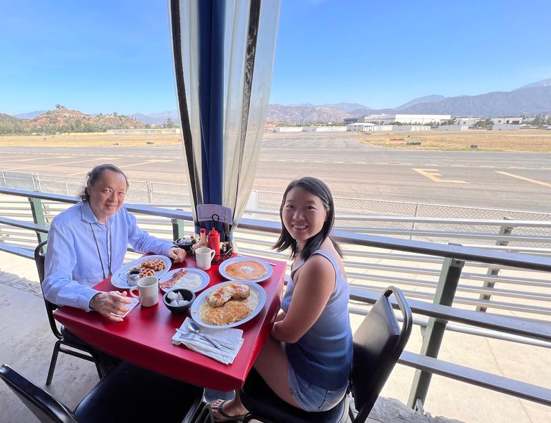 A Diner Parked Beside a Runway A Diner Parked Beside a Runway