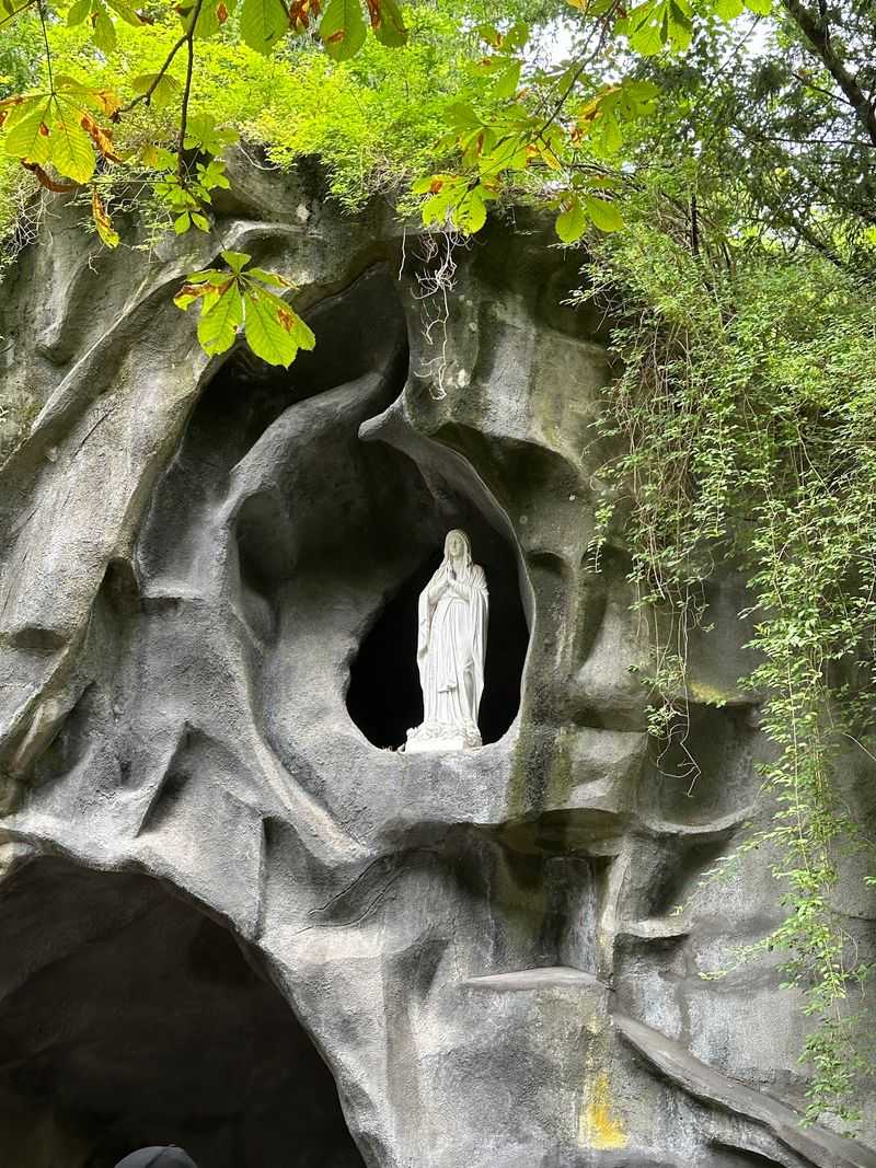 A Grotto and a Marble Tribute to Mary A Grotto and a Marble Tribute to Mary