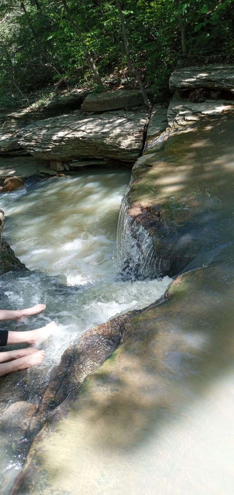 A Natural Waterfall Hidden Along the Route