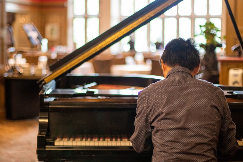 A Piano Player and the Mood It Sets A Piano Player and the Mood It Sets