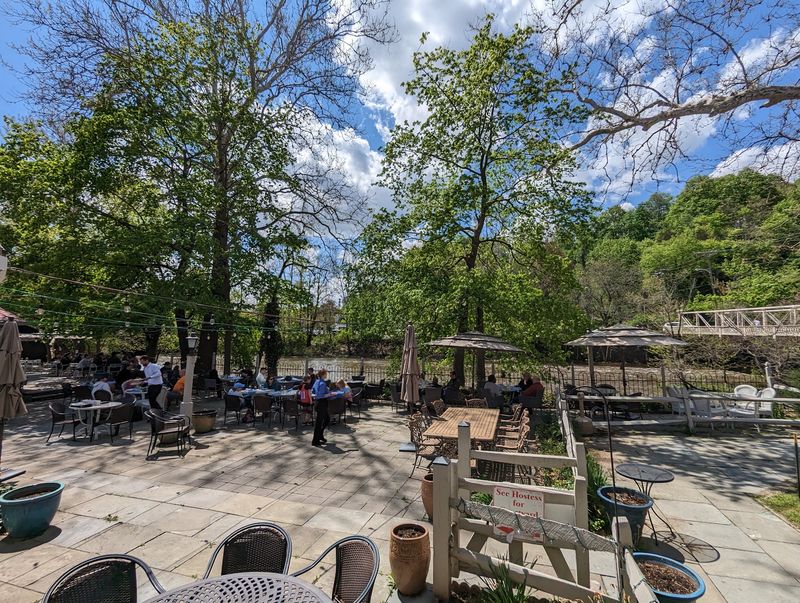 A Shady Terrace Beside The Water