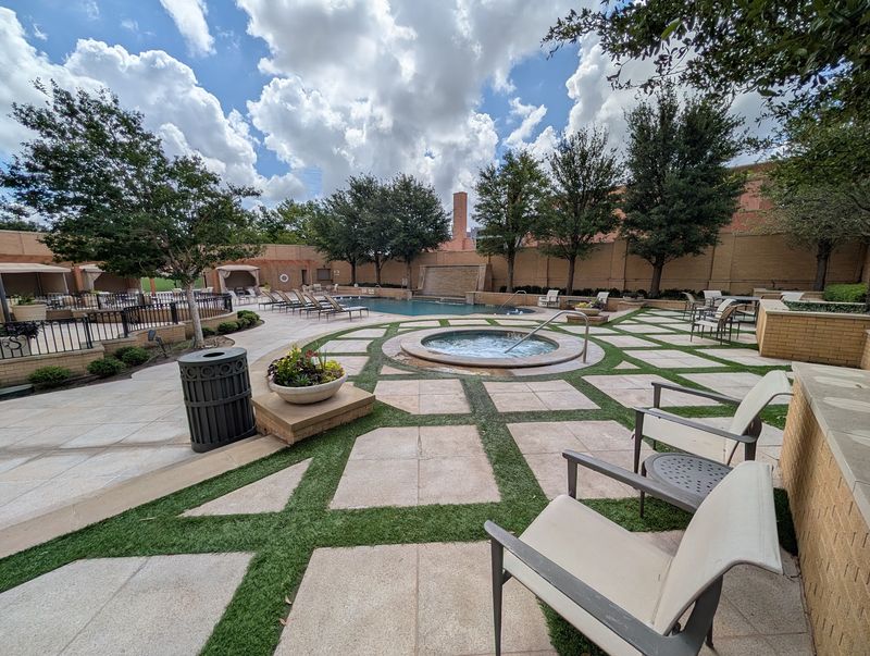 An Outdoor Pool and Courtyard Worth Lingering In An Outdoor Pool and Courtyard Worth Lingering In