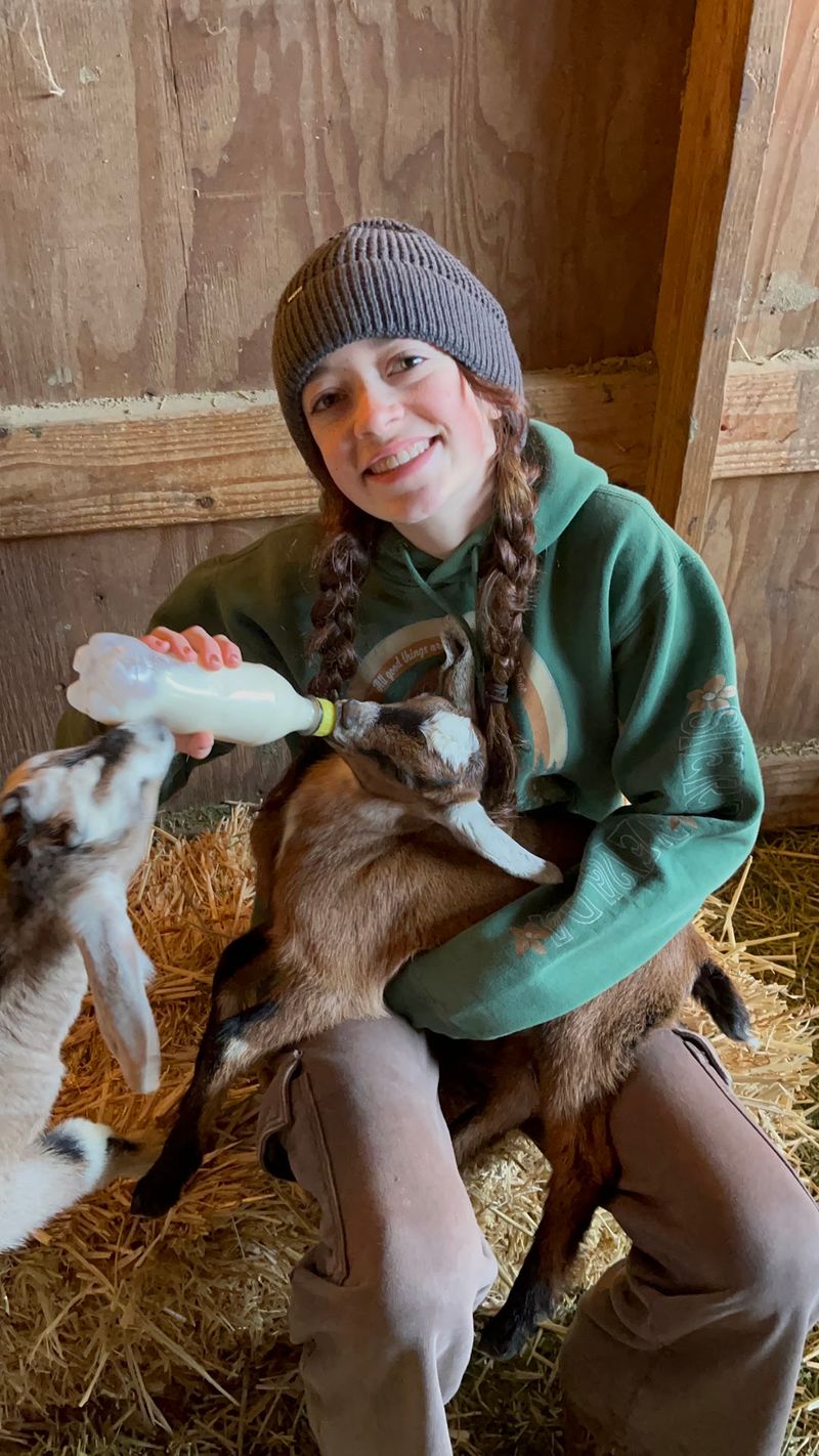 Bottle-Feeding the Baby Goats Bottle-Feeding the Baby Goats