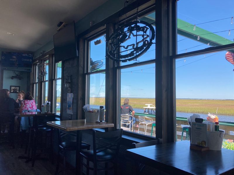 Deck seats, indoor tables, and dog-friendly flexibility