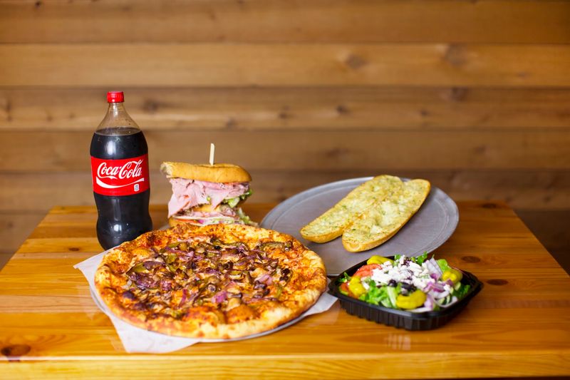 Dining Under One Roof, From Pizza To Grill Dining Under One Roof, From Pizza To Grill