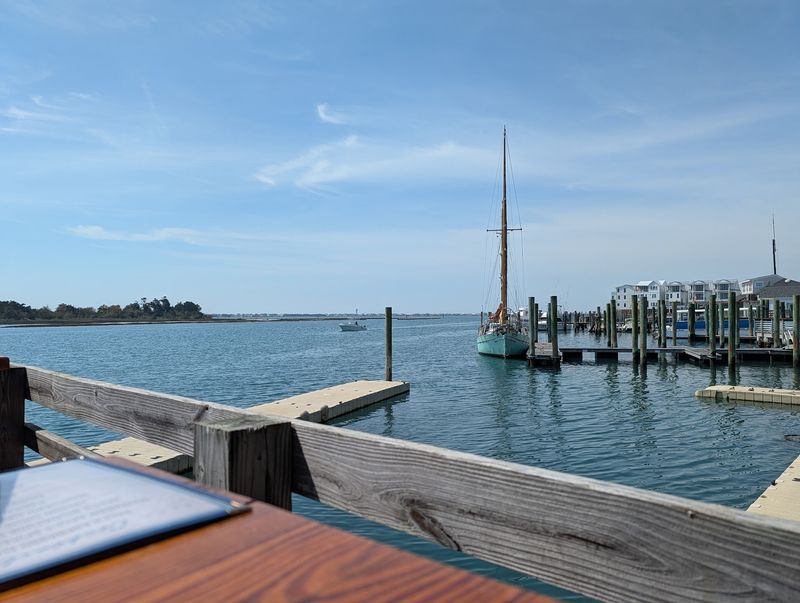 Dining on the Deck With Boats Drifting By Dining on the Deck With Boats Drifting By