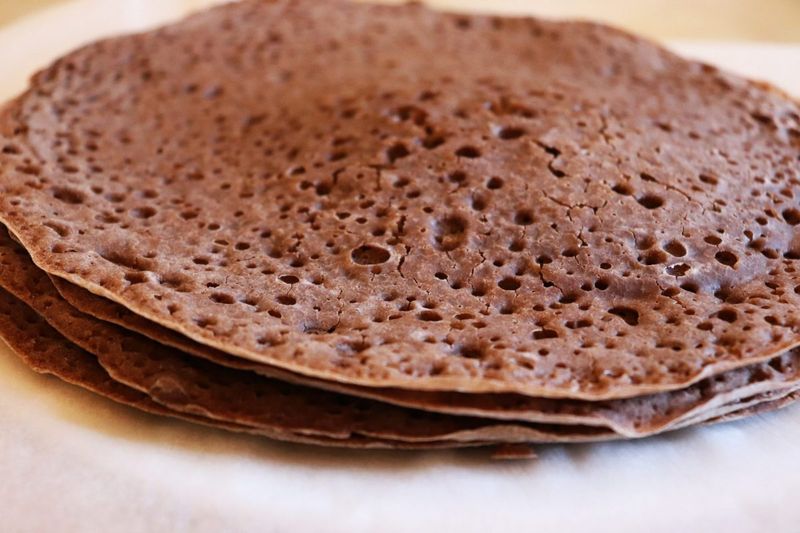 Fermented injera anchors the meal Fermented injera anchors the meal