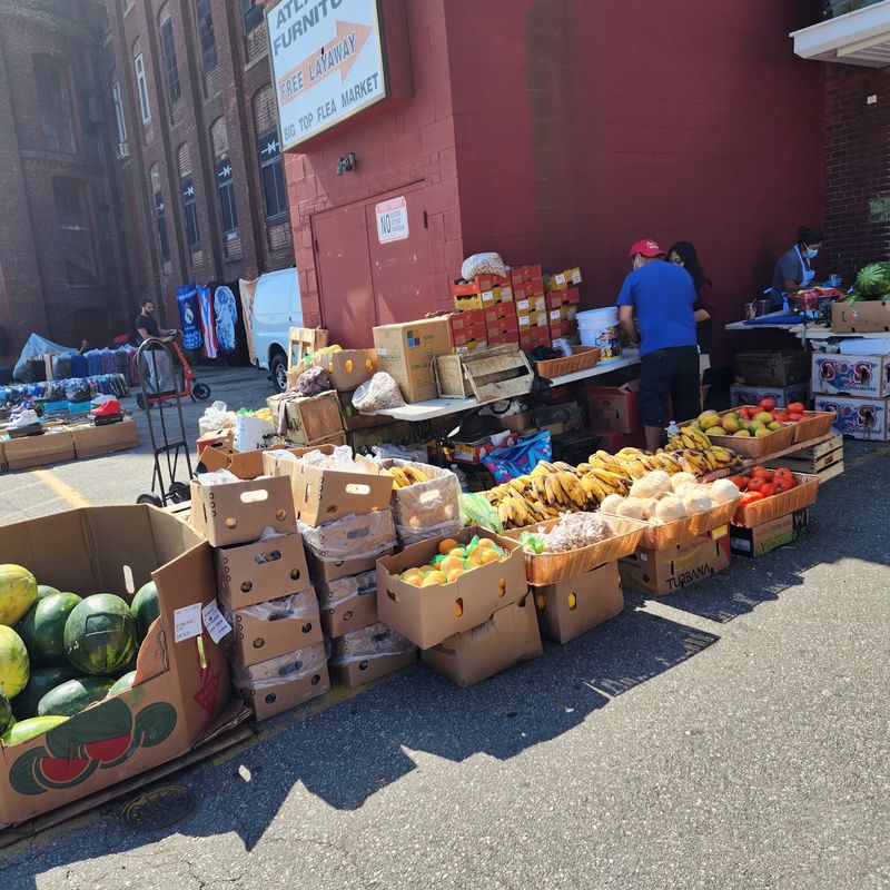 Fresh Farm Goods and the Fruit Stand Out Front