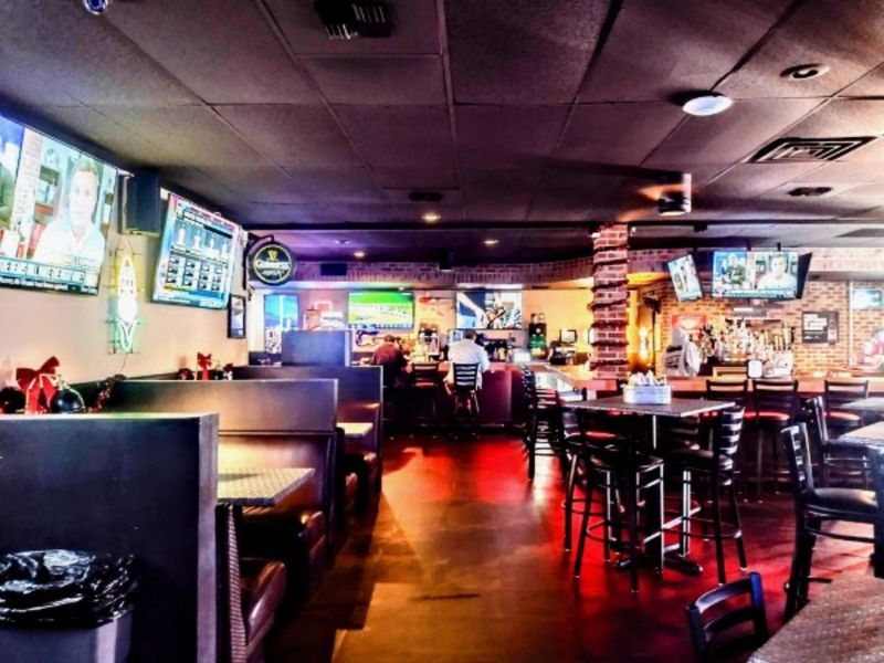 Games, Darts, and a Wall of TVs Games, Darts, and a Wall of TVs