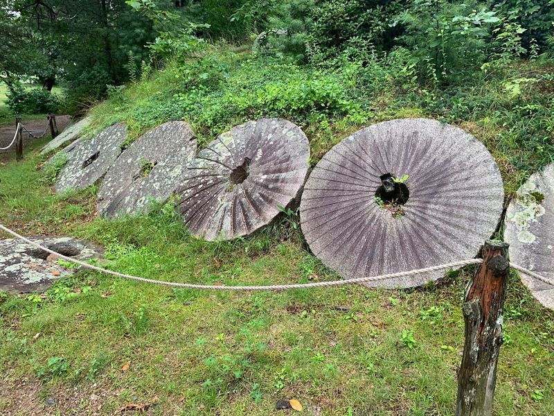 Millstones Scattered Across the Grounds Millstones Scattered Across the Grounds