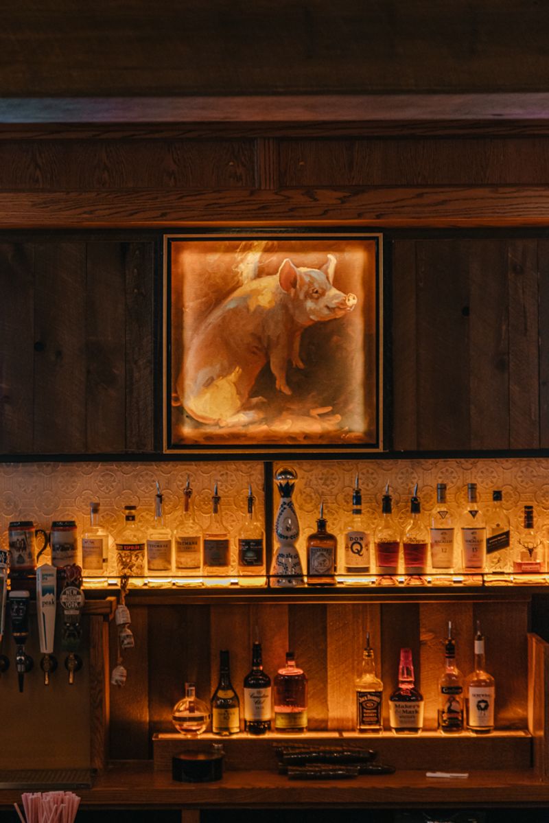 Modern Pub Charm With Fancy Pig Paintings Modern Pub Charm With Fancy Pig Paintings