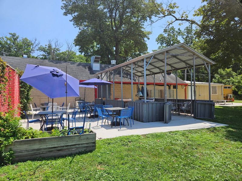 Outdoor Seating and a Round of Cornhole Outdoor Seating and a Round of Cornhole