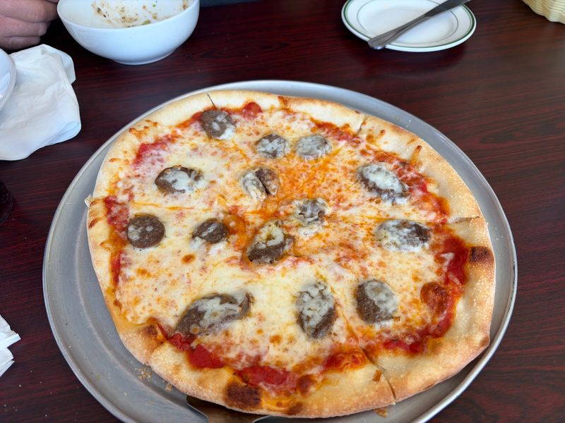 Pizza, Calzones, and the Crispy Crust That Wins People Over Pizza, Calzones, and the Crispy Crust That Wins People Over