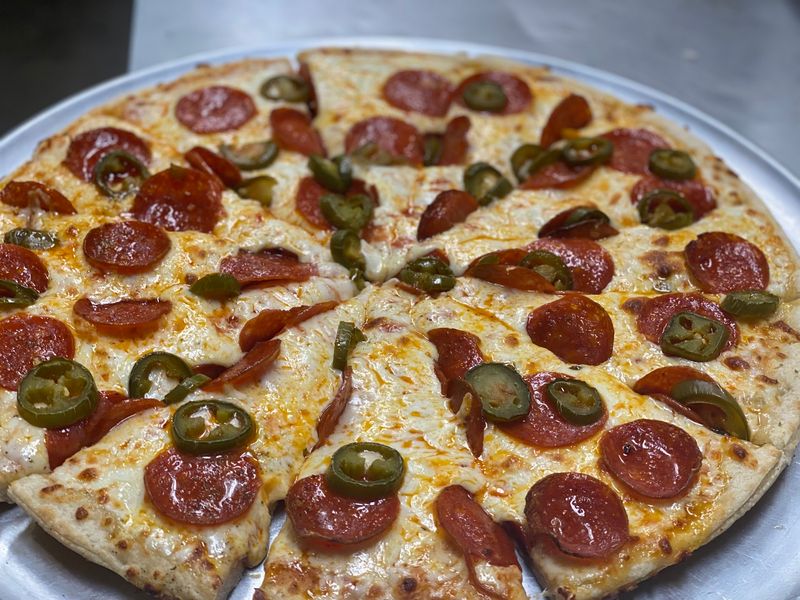 Pizza at a Mexican Grill, and It Actually Works