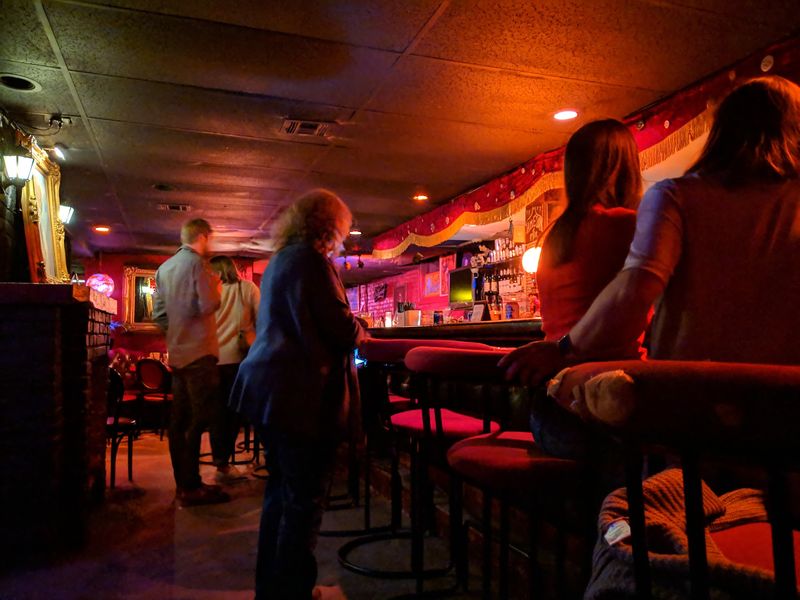 Red Lights and Velvet Drapery: The Signature Atmosphere Red Lights and Velvet Drapery: The Signature Atmosphere