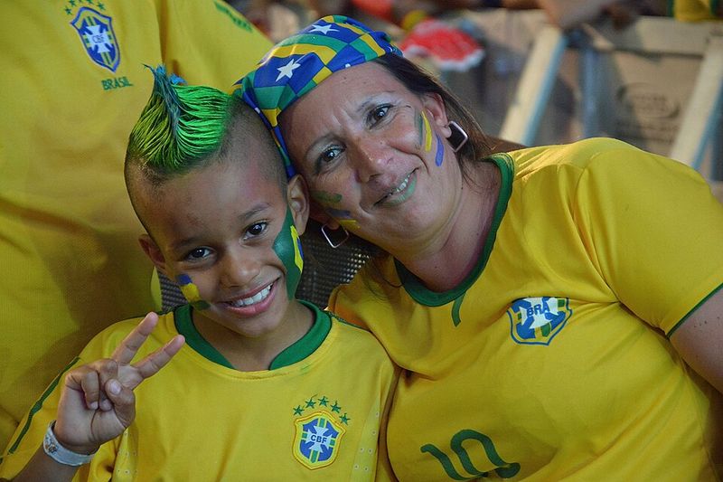 Supporters Painting Their Entire Faces in National Colors Supporters Painting Their Entire Faces in National Colors