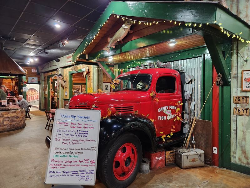 Taxidermy, a Truck, and a Pond Indoors Taxidermy, a Truck, and a Pond Indoors