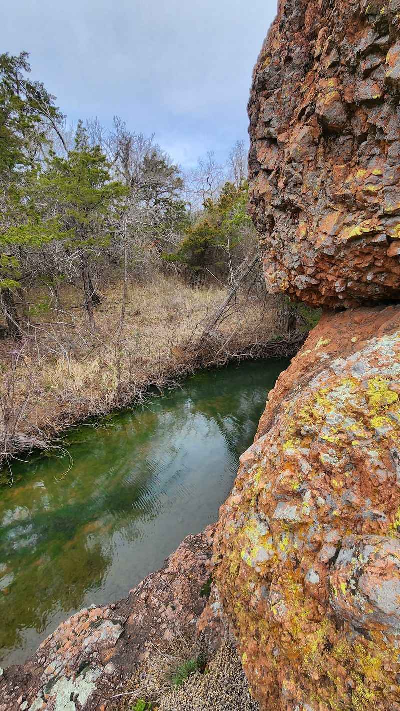 The Creek and the Rocky Landscape Beyond