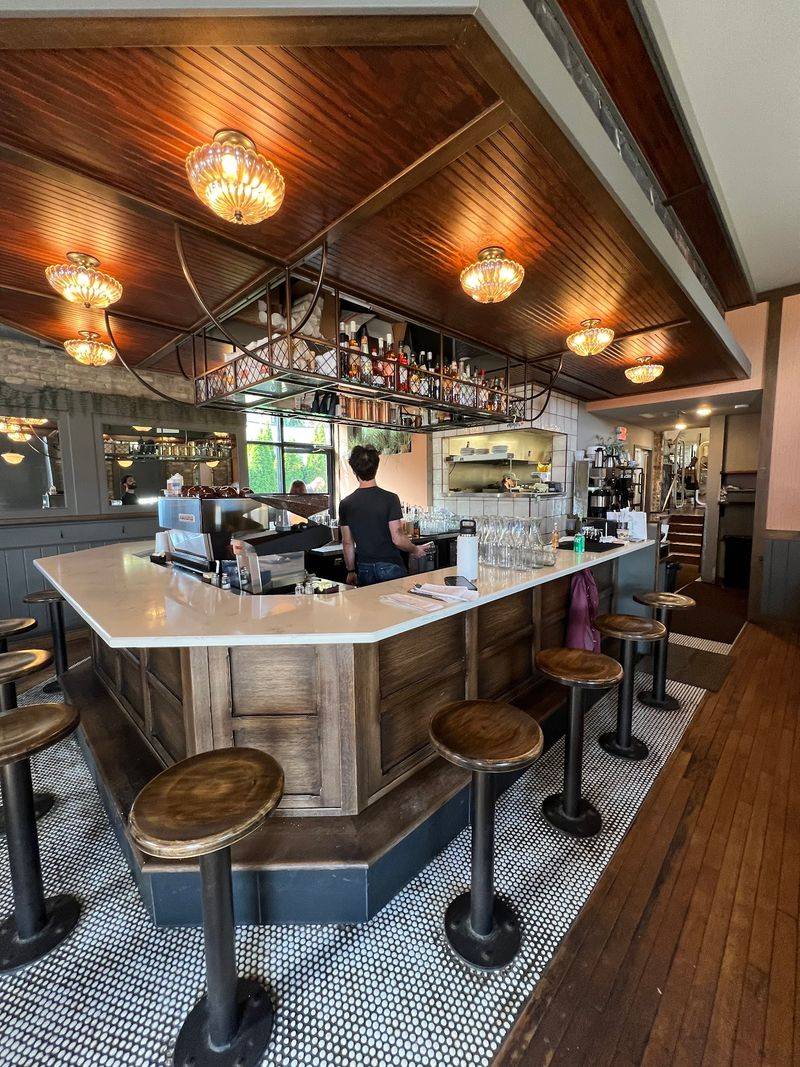 The Layout: A U-Shaped Bar and Hidden Upper Seating The Layout: A U-Shaped Bar and Hidden Upper Seating