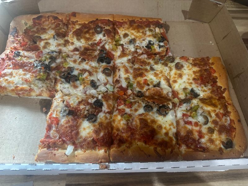 The Legendary Sheet Pizza That Keeps Omaha Coming Back The Legendary Sheet Pizza That Keeps Omaha Coming Back