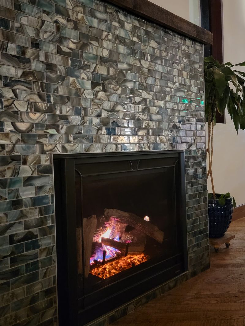 The Restoration Photos Above the Fireplace That Tell the Building's Full Story The Restoration Photos Above the Fireplace That Tell the Building's Full Story