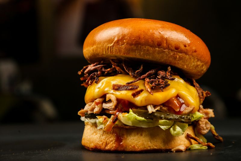 The Signature Charly Burger With Grilled Onions The Signature Charly Burger With Grilled Onions