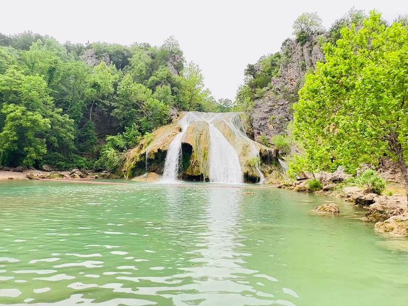 Turner Falls and its 77-foot waterfall Turner Falls and its 77-foot waterfall