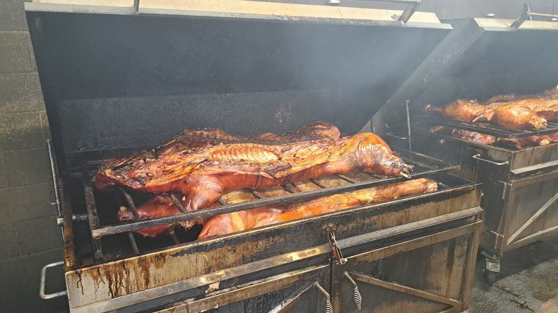 Whole Hog Cooked Over Wood Coals Whole Hog Cooked Over Wood Coals