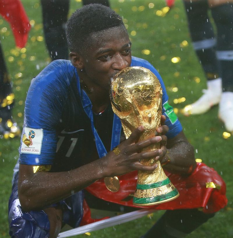 Winners Taking Turns Posing Individually with the World Cup Trophy Winners Taking Turns Posing Individually with the World Cup Trophy