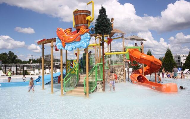At This North Carolina Campground, Kids Get A Splash Pad, A Waterslide, And Three Pools To Roam