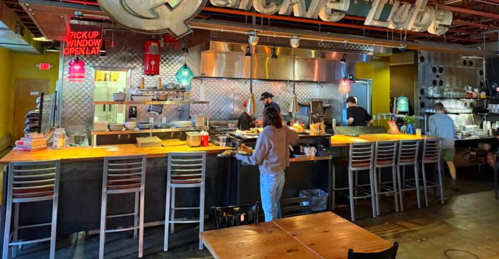 This Historic Lansing Restaurant Is Famous for Butter-Soaked Pancakes, Juicy Smash Burgers, and a Secret Basement Surprise