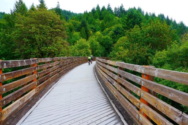 This 21-Mile Oregon Bike Trail Follows An Old Railroad Past 13 Bridges, Including Historic Railroad Trestles, and Small Communities