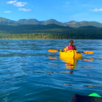 This 10-Acre Montana Park Packs Swimming, Kayaking, Camping, and Mountain Adventure Into One Stop