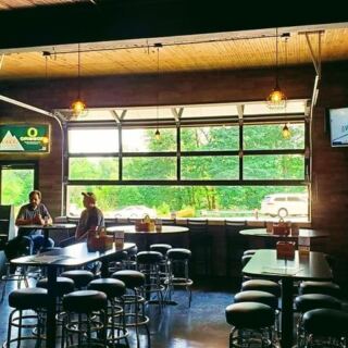 This No-Frills Oregon Roadhouse Pairs Live Music With Pinball, Pool, And Roll-Up-Door Patio Days