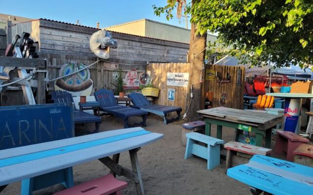 At This Wonderfully Weird North Carolina Dive Bar, You Grab Your Own Beer From a Walk-In Cooler
