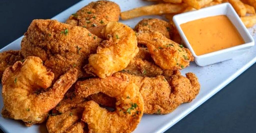 This Pennsylvania Seafood Spot Serves Colossal Shrimp, Crab-Stuffed Fries, and Gouda Grits