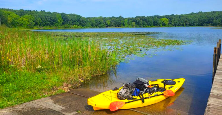 This Massive Michigan Park Has 8,000 Acres, Lakeside Trails, and a Water Obstacle Course Families Love
