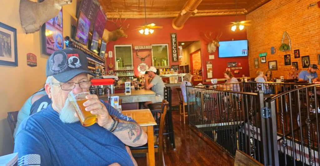 This Small Michigan Brewery Serves a Famous Elk Burger, House-Made Drinks, and a Vibe Locals Love