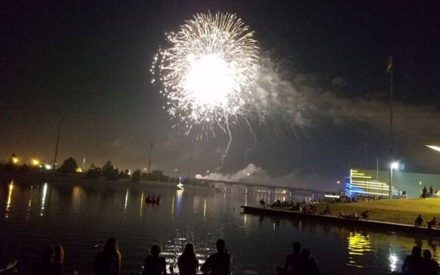 This Oklahoma River Festival In Oklahoma City Lights Up The Waterfront With Fireworks And A Fourth Of July Rowing Spectacle