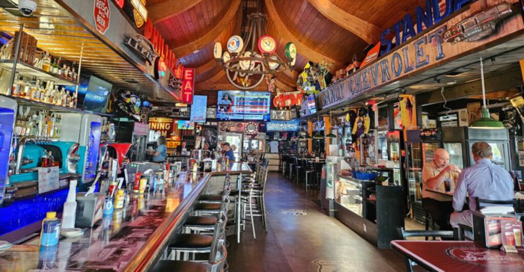 This Illinois Route 66 Restaurant Lets Diners Eat Among Race Cars, Vintage Gas Pumps, and Automotive Memorabilia