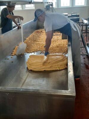 This Wisconsin Cheese Shop Lets You Watch Fresh Curds Being Made and Squeak Your First Bite