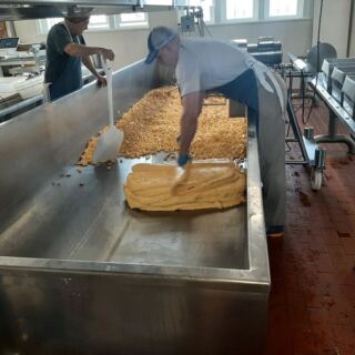 This Wisconsin Cheese Shop Lets You Watch Fresh Curds Being Made and Squeak Your First Bite