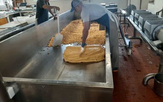 This Wisconsin Cheese Shop Lets You Watch Fresh Curds Being Made and Squeak Your First Bite