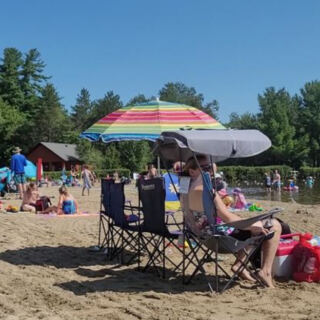 This Massachusetts State Park Has a Big Sandy Lake Beach With a Roped-Off Swim Area and a Gentle Sandy Bottom