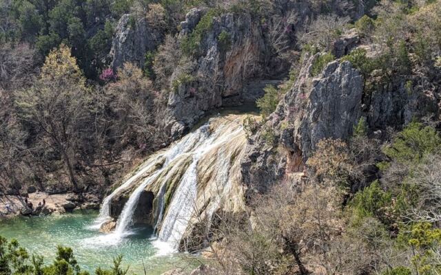 This Hidden Oklahoma Oasis Hides Waterfalls and Clear Swimming Holes You’d Never Expect in the Plains