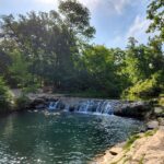 This Oklahoma Mineral Spring Hides Crystal-Clear Pools and a Riverside Setting With Zero Entrance Fee
