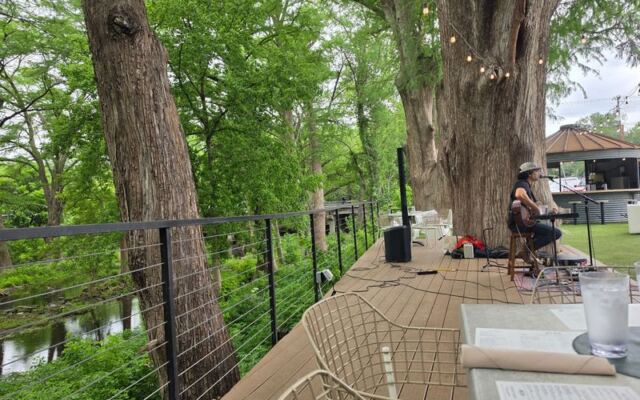 This Texas Restaurant Serves Farm-Fresh Plates On A Cypress Creek Patio Made For Lingering