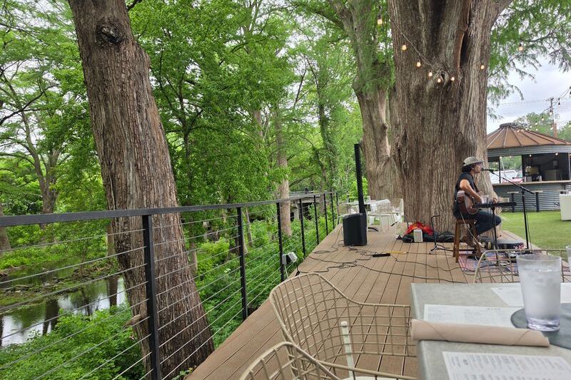This Texas Restaurant Serves Farm-Fresh Plates On A Cypress Creek Patio Made For Lingering